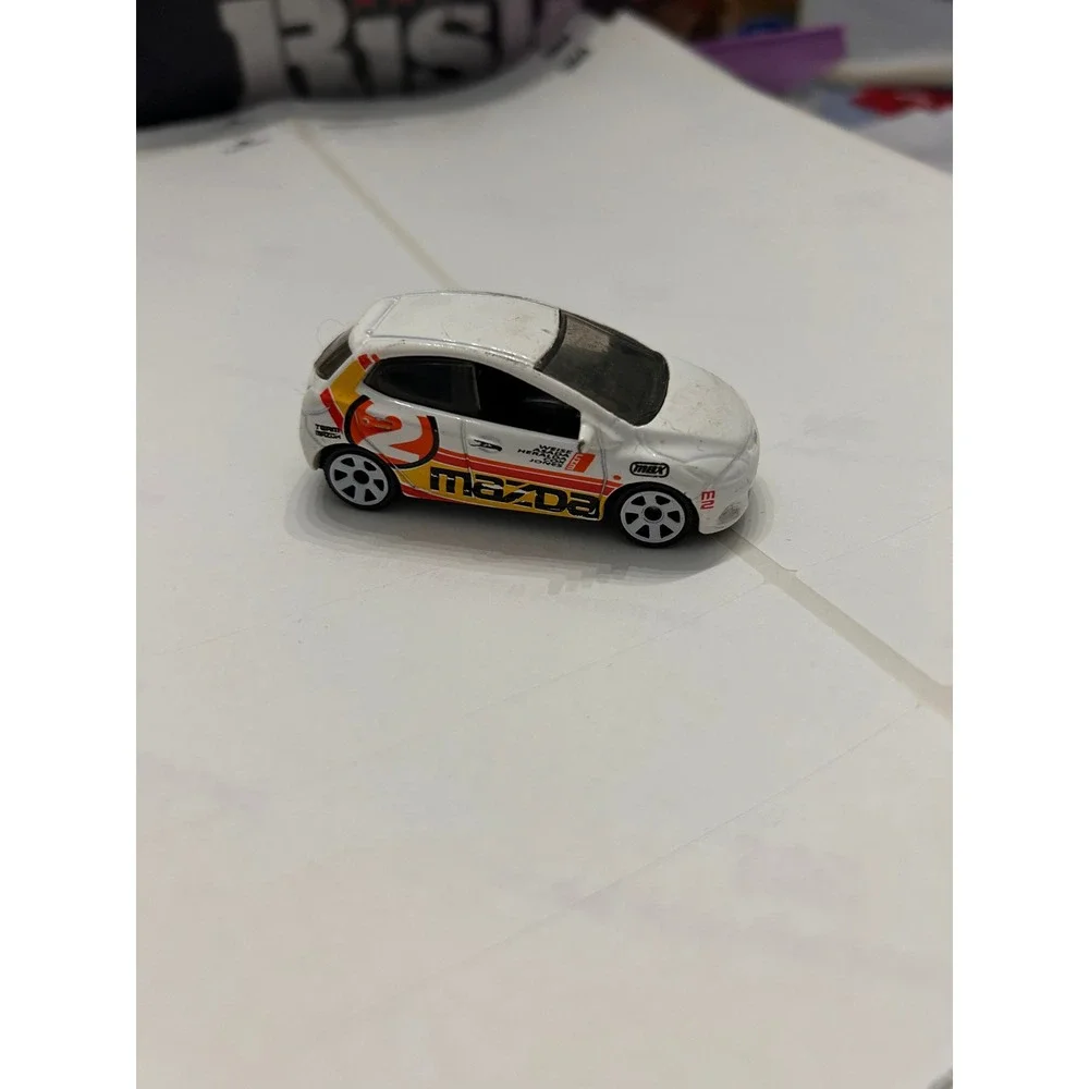 Matchbox 2008 Mazda 2 White Racing Graphics Diecast Car 1:64 Mattel M8762